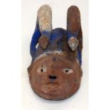 A TRIBAL YORUBA GELEDE HELMET MASK. Nigeria. 18cm x 24cm x 33cm