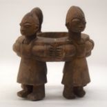 A TRIBAL YORUBA FIGURAL GROUP. Nigeria. 18cm x 18cm x 20cm