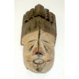 A TRIBAL IGBO MASK. Nigeria. 16cm x 10cm x 27cm