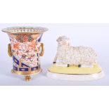 AN EARLY 19TH CENTURY ENGLISH IMARI VASE together with a staffordshire sheep. (2)