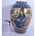 A MIDDLE EASTERN IZNIK FAIENCE PERSIAN VASE painted with floral sprays. 34 cm high.