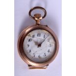 AN EDWARDIAN 14CT GOLD FOB WATCH. 18.8 grams overall. 2.5 cm wide.