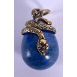 A CONTINENTAL SILVER SNAKE LAPIS LAZULI PENDANT. 2.5 cm x 1.25 cm.