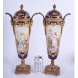 A LARGE PAIR OF 19TH CENTURY FRENCH SEVRES PORCELAIN VASES AND COVERS pained with romantic scenes. 4