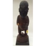 A TRIBAL MUMUYE FIGURE. Nigeria. 19cm x 19cm x 59m