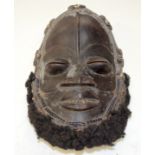 A TRIBAL DAN MASK. Ivory Coast. 22cm x 12cm x 32cm