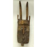 A TRIBAL BOBO MOTO BLACKSMITH MASK. Burkina Faso. 22cm x 16cm x 91cm