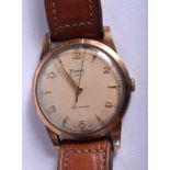 A VINTAGE 9CT GOLD TIMOR WATCH. 3.25 cm wide.