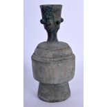 A 12TH/13TH CENTURY MIDDLE EASTERN BRONZE PERFUME BOTTLE with dimpled neck. 17 cm high.