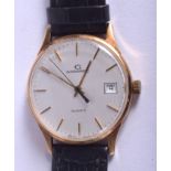 A BOXED 1970S 9CT GOLD GARRARD WRISTWATCH. 3.25 cm wide.