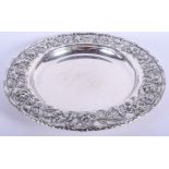 A LARGE VINTAGE S KIRK & SON SILVER CIRCULAR DISH decorated with flowers. 35.8 oz. 31 cm wide.