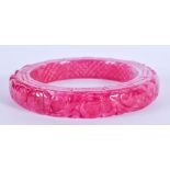A CHINESE PINK JADE BANGLE. 8 cm wide.