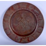 A MIDDLE EASTERN SAFAVID MUGHAL COPPER PLATE decorated with medallions. 23.5 cm wide.