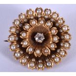 AN ANTIQUE EDWARDIAN GOLD DIAMOND AND SEED PEARL BROOCH. 9.2 grams. 2.25 cm wide.