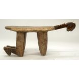 A TRIBAL LOBI STOOL. Burkina Faso. 15cm x 14cm x 38cm