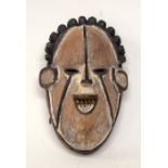 A TRIBAL IGBO MASK. Nigeria. 13cm x 9cm x 22cm