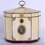 A LARGE GEORGE III CARVED BONE TEA CADDY with silver plaque, decorated with motif