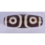 A CHINESE TIBETAN GOLD INLAID AGATE ZHU BEAD. 2.5 cm wide.