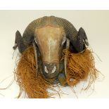 A TRIBAL BAULE RAM MASK. Ivory Coast. 33cm x 16cm x 32cm