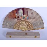 AN ANTIQUE CONTINENTAL PAINTED AND LACQUERED BONE FAN. 52 cm wide.