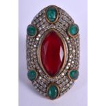 A LARGE EASTERN SILVER AND GEM STONE RING. N/O.