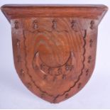 AN ARTS AND CRAFTS CARVED OAK WALL BRACKET in the manner of Pugin. 22 cm x 22 cm.