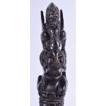 A 19TH CENTURY SOUTH EAST ASIAN CARVED RHINOCEROS HORN DAGGER HANDLE formed with a figure and a beas
