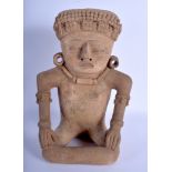 A LARGE SOUTH AMERICAN TERRACOTTA FIGURE OF A GOD possibly Mayan, modelled wearing a bead necklace.