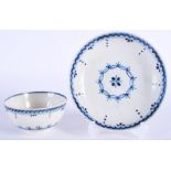 AN 18TH CENTURY LIVERPOOL TEA BOWL AND SAUCER with Barbed Chain and Ribbon Border. 13.5 cm wide.