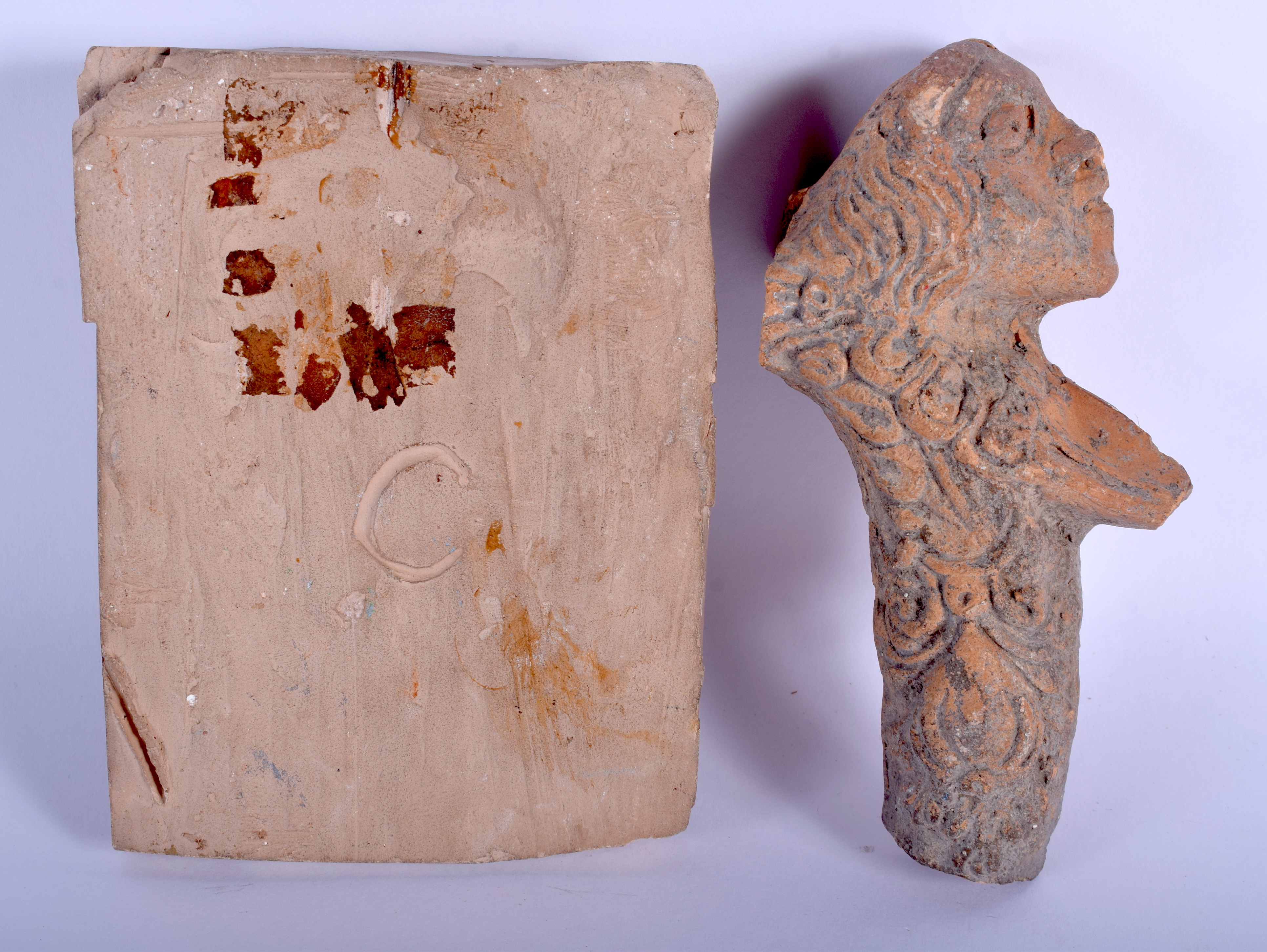 TWO LARGE SOUTH EUROPEAN CARVED TERRACOTTA FRAGMENTS possibly Roman. Largest 10 cm x 12 cm. (2) - Image 2 of 2