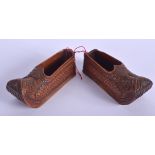 A PAIR OF ANTIQUE CONTINENTAL WOOD CLOGS. 8 cm wide.