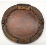 A TRIBAL YORUBA DIVINATION PLATE (OPON IFA). Nigeria. 32cm x 3cm x 32cm