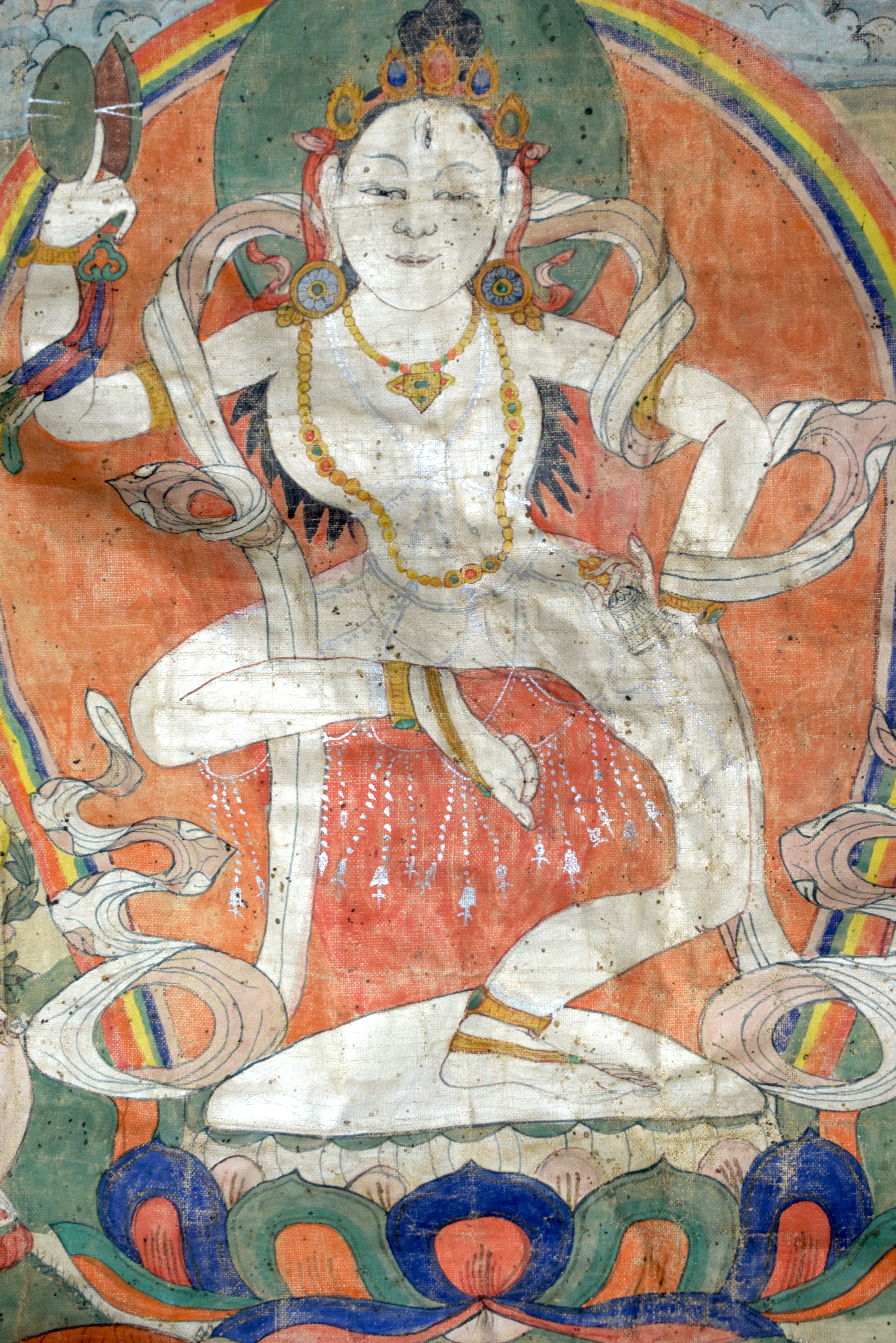 A 19TH CENTURY TIBETAN THANGKA depicting dakini, the white figure dancing upon a lotus, surrounded b - Image 2 of 6