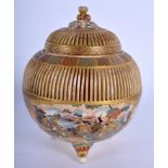 A 19TH CENTURY RETICULATED SATSUMA CENSER AND COVER painted with figures and landscapes. 12 cm x 8 c