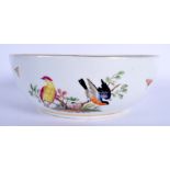 A MEISSEN PORCELAIN BOWL painted with birds. 21 cm wide.