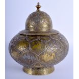 AN 18TH/19TH CENTURY MIDDLE EASTERN ISLAMIC SILVER INLAID VASE AND COVER decorated with figures and