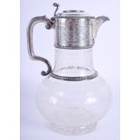 A VICTORIAN SILVER AND CRYSTAL GLASS CLARET JUG. 23 cm x 11 cm.
