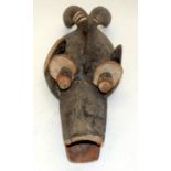 A TRIBAL MUMUYE MASK. Nigeria. 17cm x 15cm x 44m