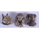 THREE SILVER DOG BROOCHES. (3)