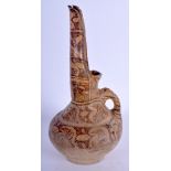 A 10TH CENTURY MIDDLE EASTERN UNGLAZED PAINTED CERAMIC WATER JUG painted with motifs. 24 cm high.