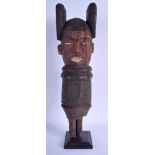 A TRIBAL AFRICAN CONGOLESE DEMOCRATIC REPUBLIC OF CONGO KUYU FIGURE upon a later stand. Figure 51 cm