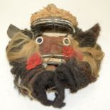 A TRIBAL GURO MASK. Liberia. 34cm x 15cm x 30cm