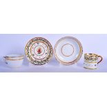 A LATE 18TH CENTURY CONTINENTAL CUP AND SAUCER and a French saucer. (3)