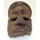 A TRIBAL OGONI MASK. Nigeria. 24cm x 29cm x 33cm