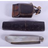 A 19TH CENTURY CONTINENTAL CARVED RHINOCEROS HORN WHISTLE together with a silver bladed fruit knife.