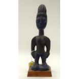 A TRIBAL YORUBA IBEJI FIGURE. Nigeria. 9cm x 8cm x 29cm