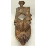 A TRIBAL BWA HORNBILL MASK. Burkina Faso. 24cm x 25cm x 71cm