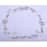 A SILVER AND PEARL NECKLACE. 66 cm long.
