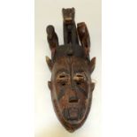 A TRIBAL YORUBA GELEDE MASK. Nigeria. 16cm x 20cm x 47cm