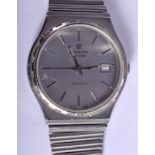 A BOXED VINTAGE MARVIN REVUE STAINLESS STEEL WRISTWATCH. 3.25 cm wide.